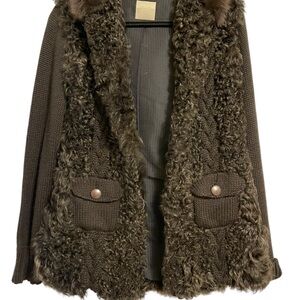 Luxury cardigan from Zurich Switzerland.  A fashion statement on the “fur”side.